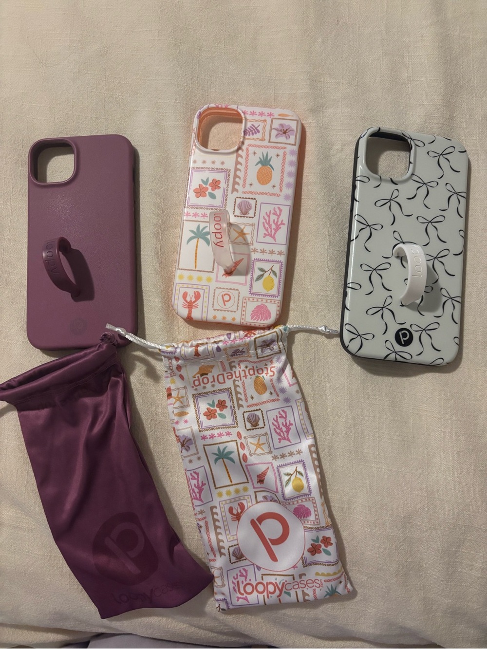 Loopy Case Trio - Plum, Pastel Pattern, White with Black Bow iPhone 15 Plus